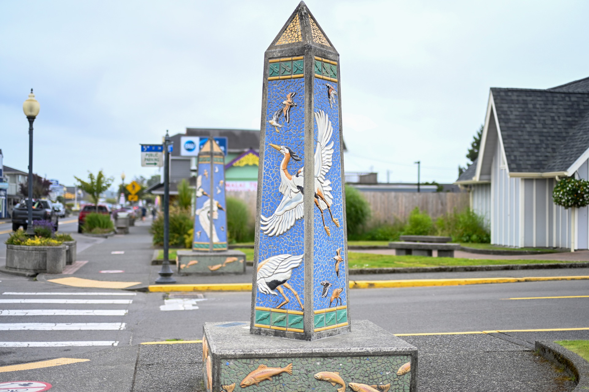 Mosaic obelisk sculpture